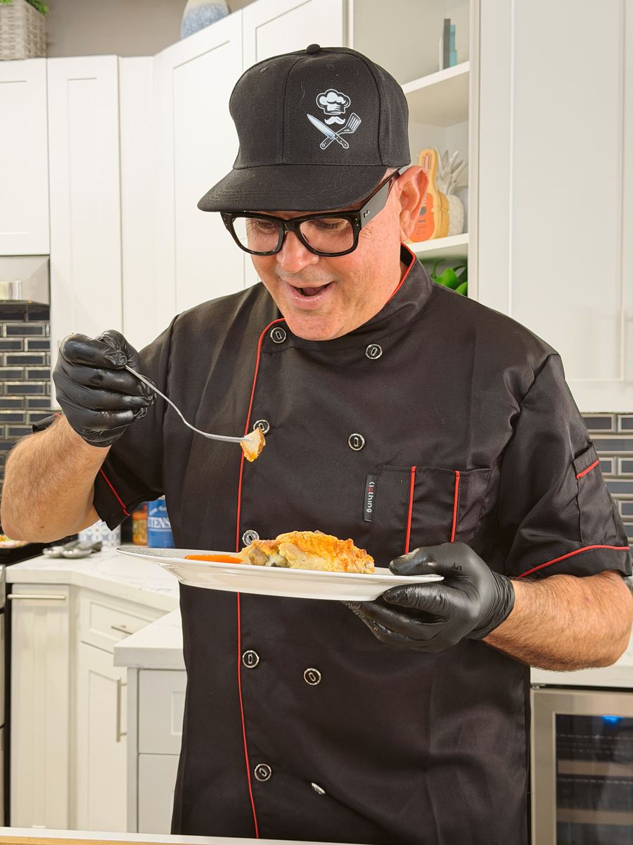 Chef Tito plating a custom dish at a Miami event